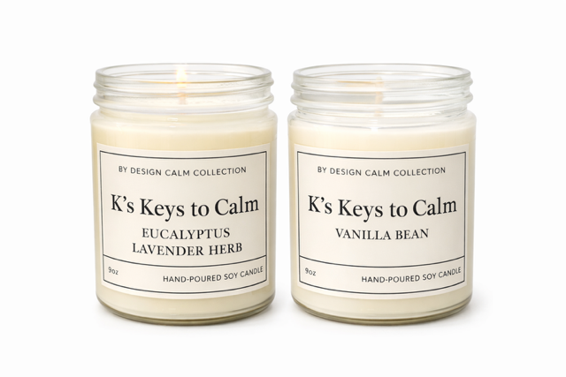 Two candles from the K's Keys to Calm collection on a white background