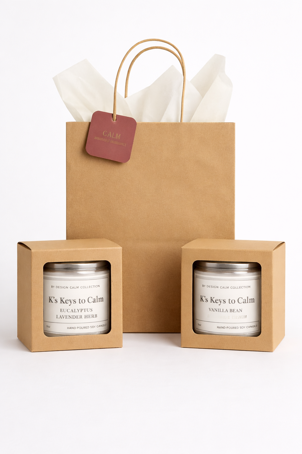 Two candles in boxes with a gift bag on a white background