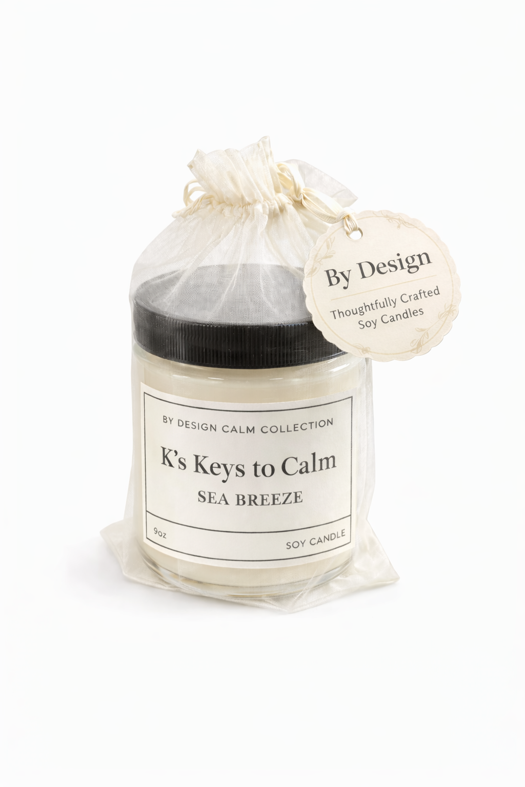 Candle labeled 'K's Keys to Calm Sea Breeze' by By Design on a white background