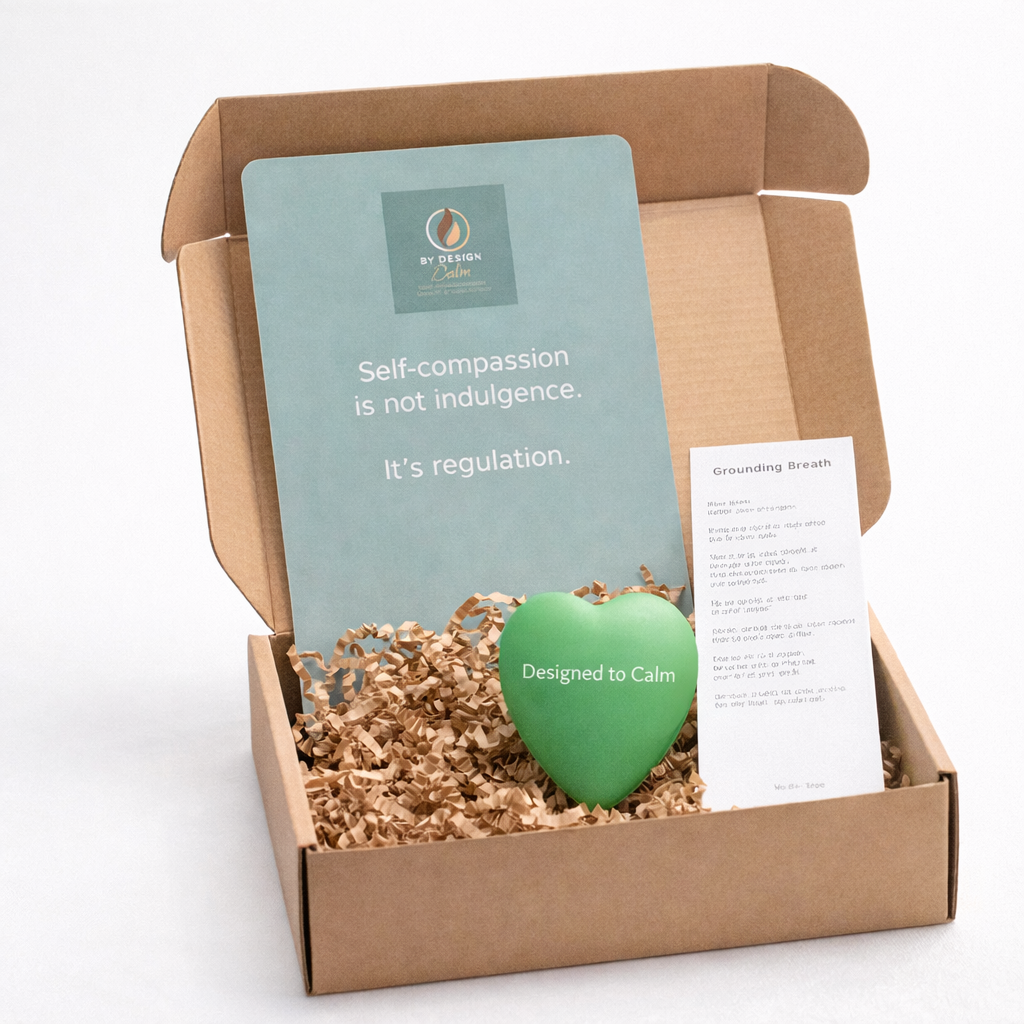 Box containing a green heart-shaped stress ball, a card, and a leaflet on a white background