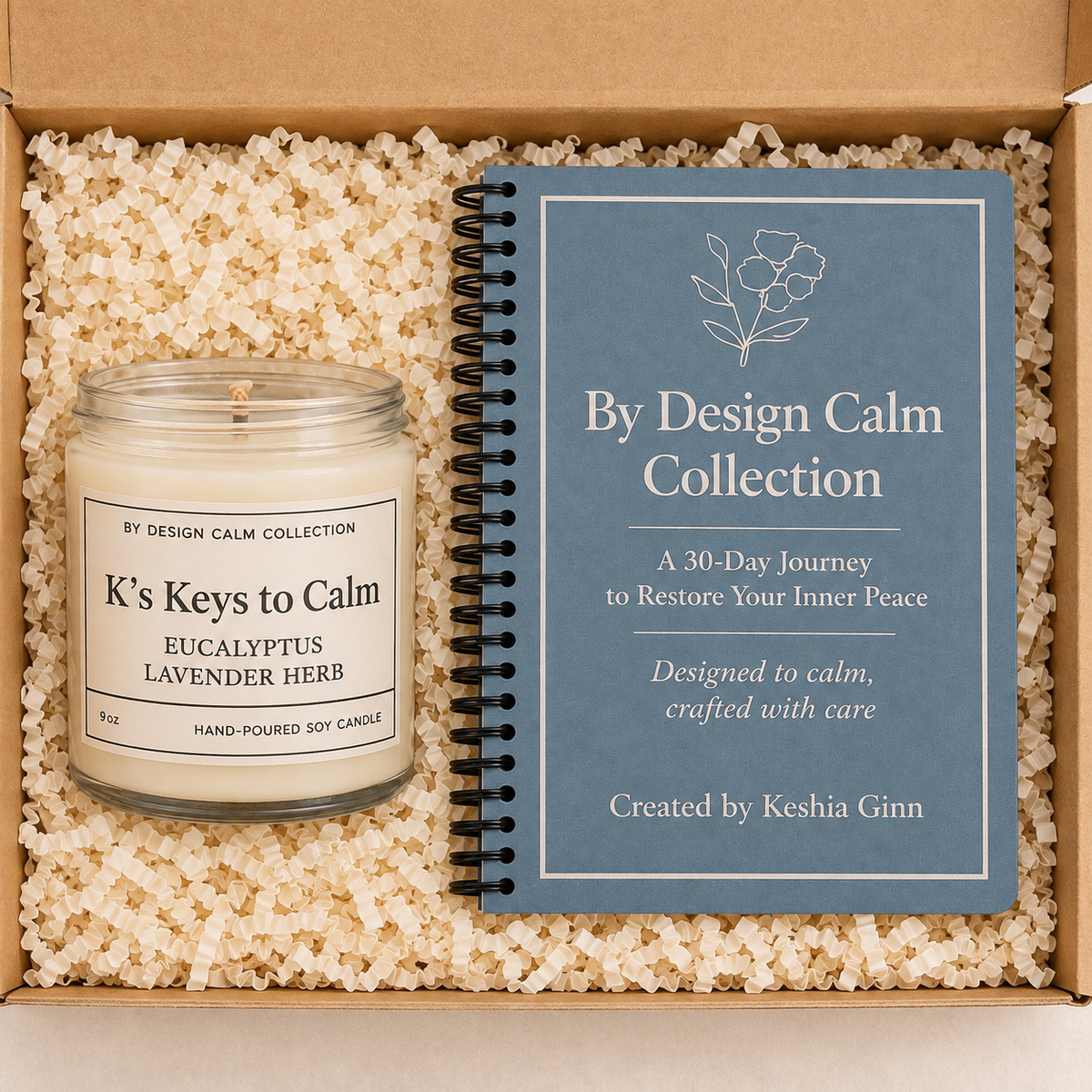 Top view of a 9 oz soy candle and spiral-bound Calm Journal presented together in a kraft gift box.