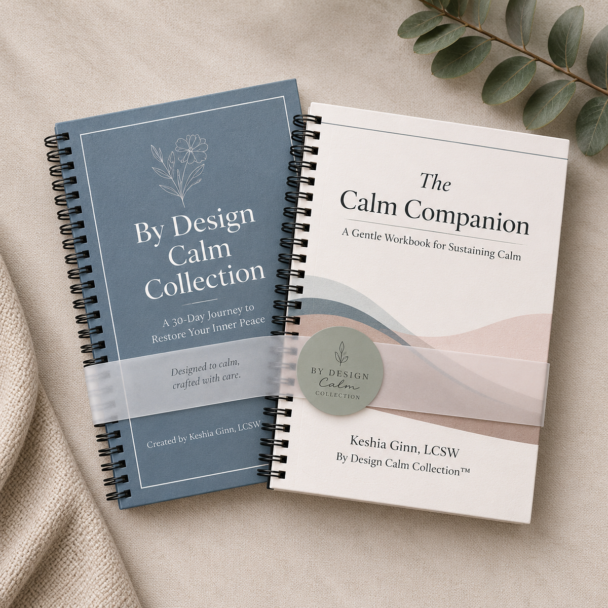 By Design Calm Collection Journal and The Calm Companion workbook stacked together in a soft neutral setting.