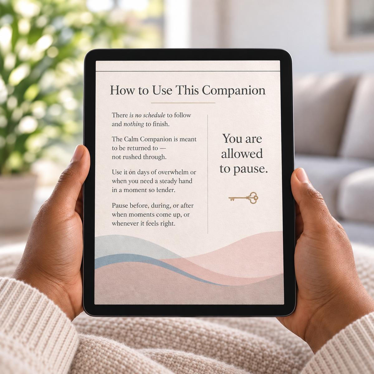 Hand holding a tablet displaying an interior reflection page from The Calm Companion digital workbook.