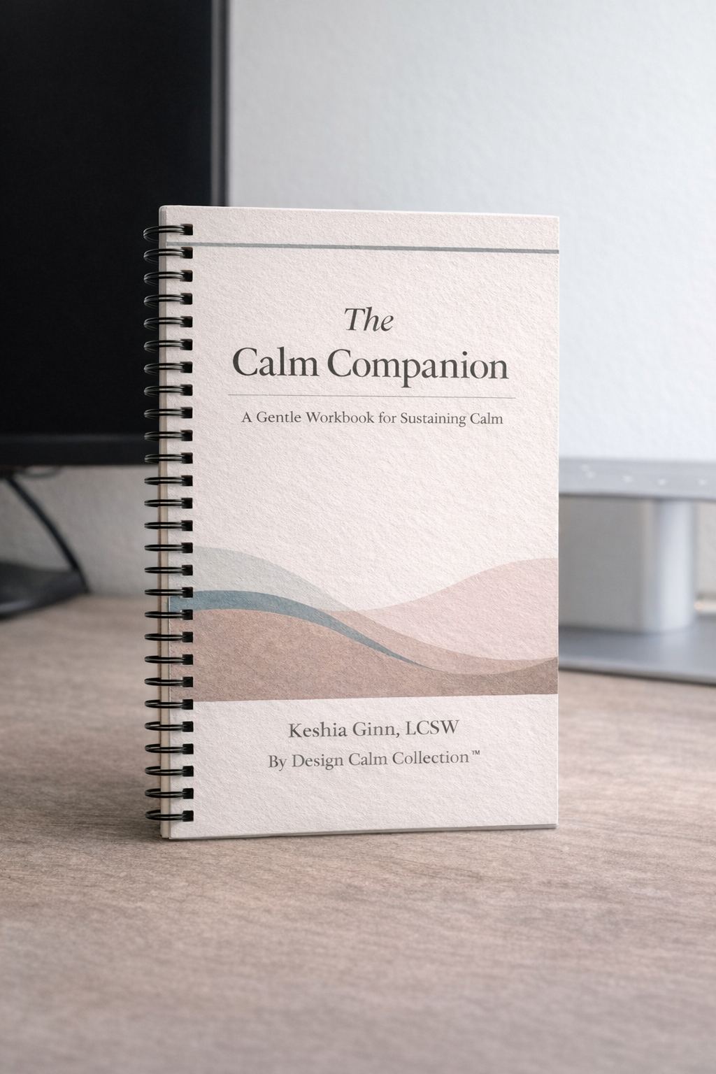 Book titled 'The Calm Companion' on a desk with a blurred background